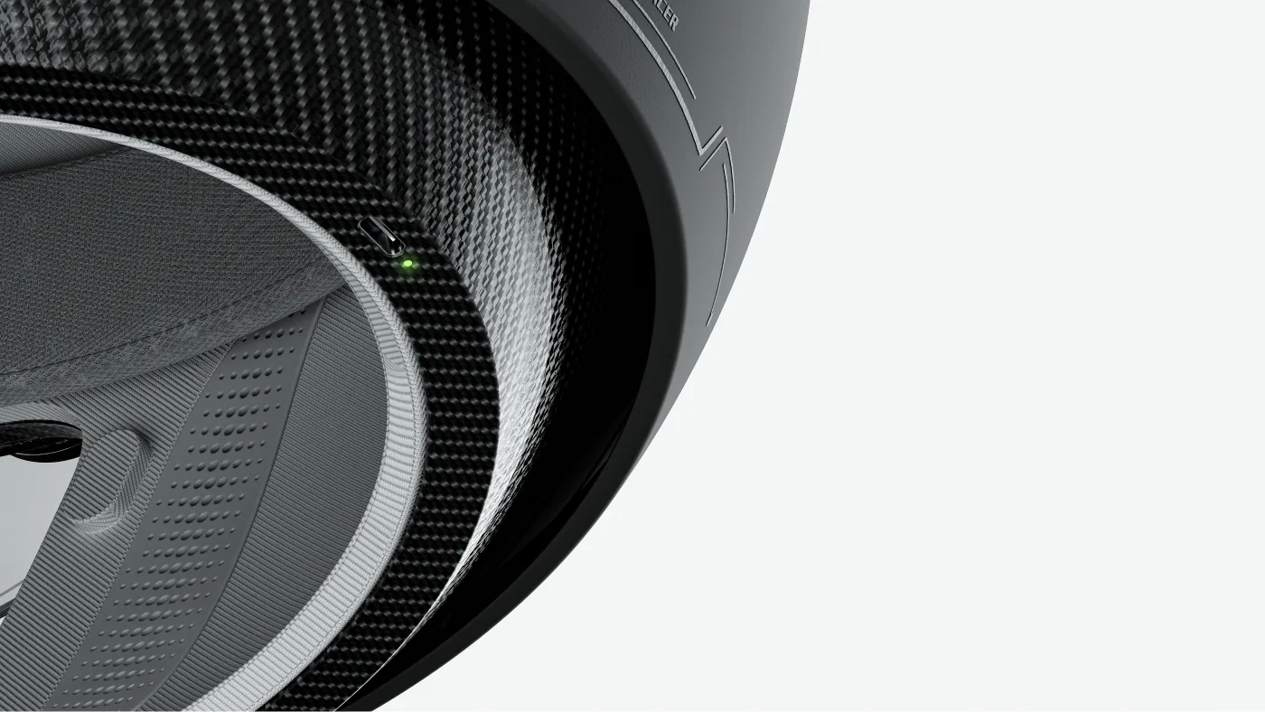 Charging port and status light inside the rim