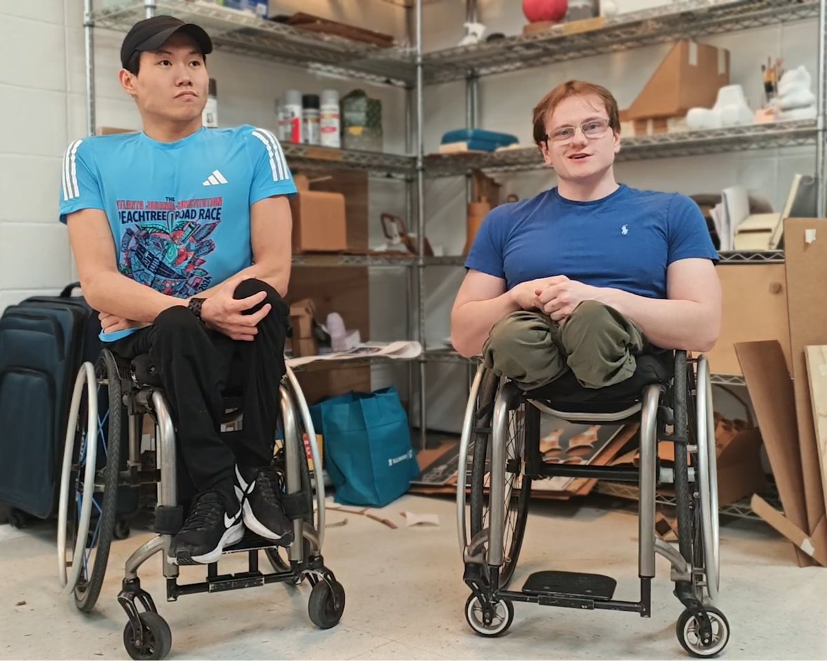 Leo and Phillip Croft, both seated in wheelchairs, during the interview