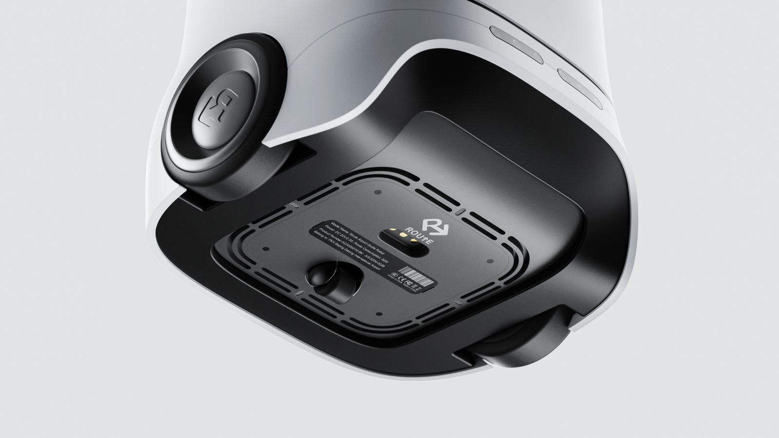 ROUTE from below: the drive wheel, the caster and the charging contacts