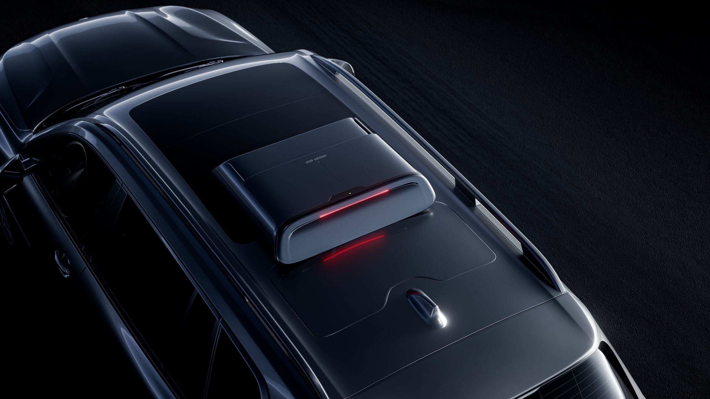 UOSON closed in its slim case on the roof of a dark car